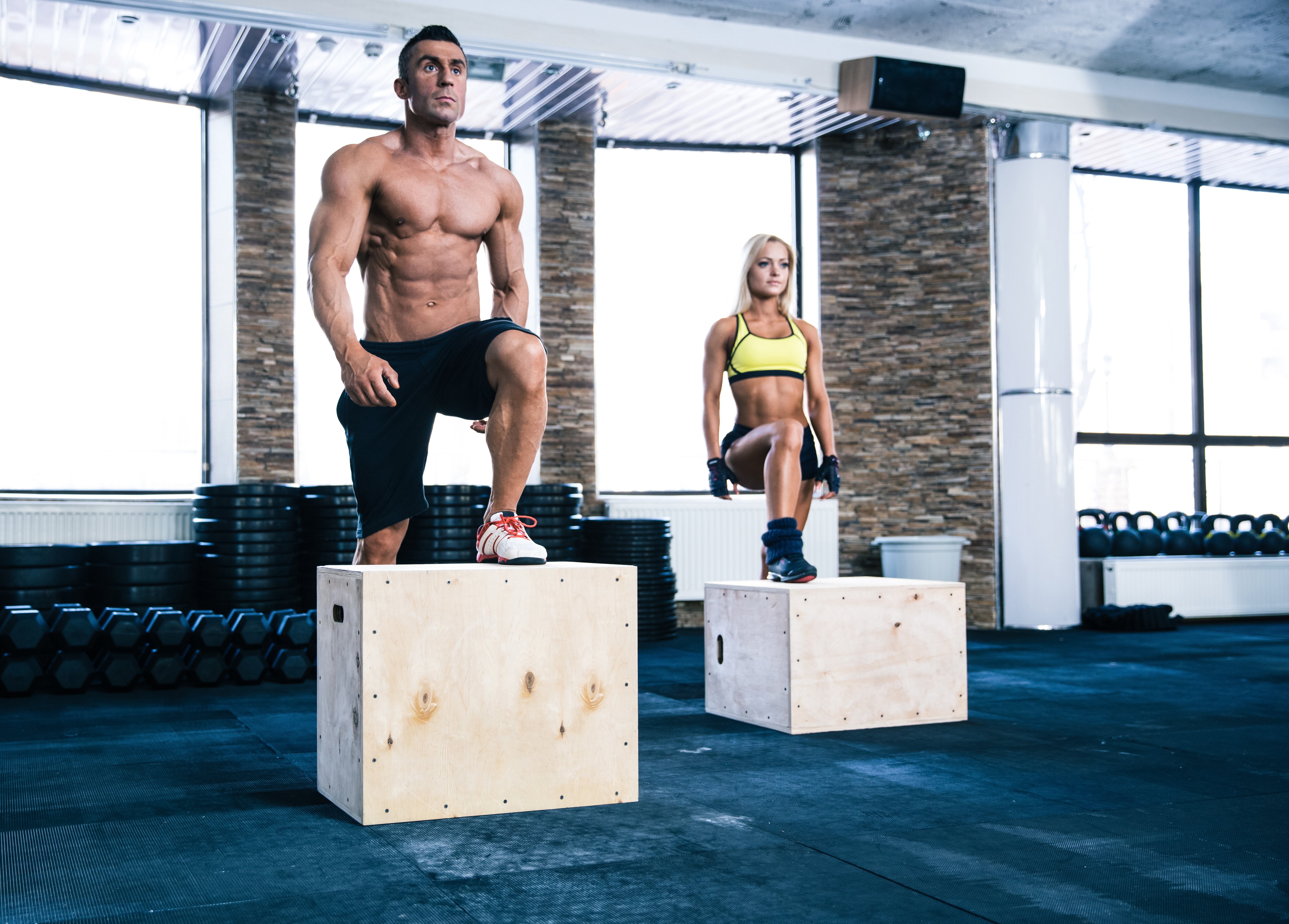 group-of-man-and-woman-working-out-with-fit-box-SBI-300967013